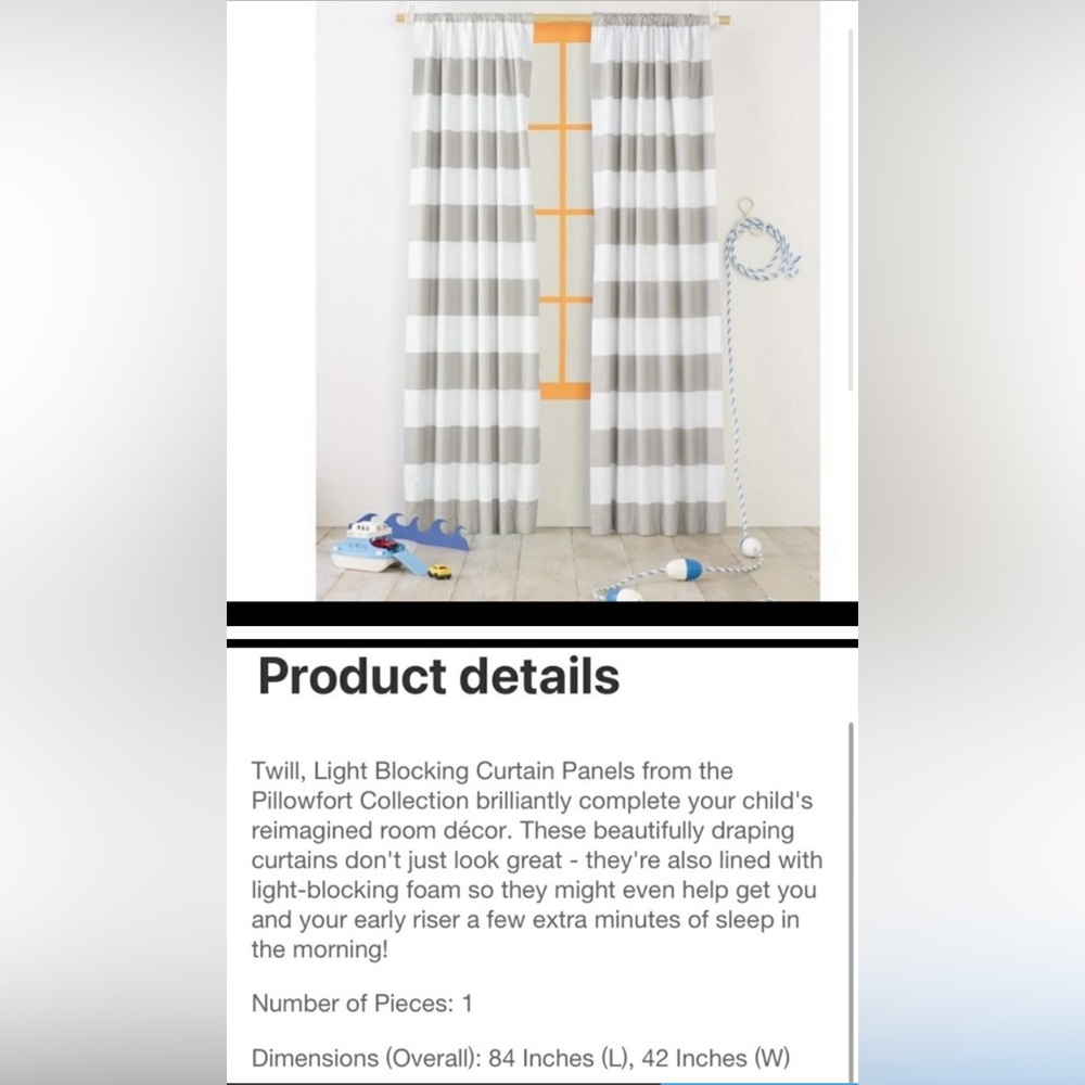 Pillowfort striped blackout curtain panels.